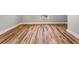 Image showcases newly installed light hardwood floors at 939 Whistler Ln, Canton, GA 30114