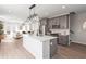Modern kitchen featuring a center island with white countertops, gray cabinetry, and stainless steel appliances at 1991 Hollywood Nw Rd # 14, Atlanta, GA 30318