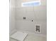 The laundry room features new tile floors and modern hookups at 1991 Hollywood Nw Rd # 14, Atlanta, GA 30318