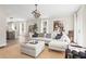 Open-concept living room with a large sectional sofa, modern decor, and an abundance of natural light at 1991 Hollywood Nw Rd # 14, Atlanta, GA 30318