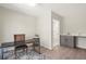 Office with a dark desk, a chair, and modern gray cabinets at 1991 Hollywood Nw Rd # 14, Atlanta, GA 30318