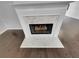 Elegant fireplace with marble tile surround at 1235 Park Pass Way, Suwanee, GA 30024