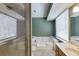 Beautiful bathroom featuring a walk in shower, soaking tub, vanity and bright window at 2011 Two Springs Way, Lawrenceville, GA 30043