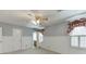 Bedroom with wainscotting, carpeted flooring, and an attached ensuite bathroom at 2011 Two Springs Way, Lawrenceville, GA 30043