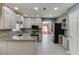 Updated kitchen with stainless steel appliances, granite counters, breakfast bar, and an adjacent eating area at 2011 Two Springs Way, Lawrenceville, GA 30043