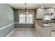 View of kitchen with granite countertops and stainless steel appliances at 2011 Two Springs Way, Lawrenceville, GA 30043