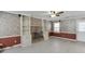 Spacious living room with brick fireplace, built-in bookshelves, and neutral-toned walls at 2011 Two Springs Way, Lawrenceville, GA 30043