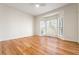 Bedroom boasting hardwood floors and a bay window that provide lots of natural light at 2704 Loring Nw Rd, Kennesaw, GA 30152