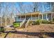 Lovely single-story home featuring a covered front porch at 2704 Loring Nw Rd, Kennesaw, GA 30152