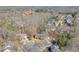 Overhead shot of a home surrounded by trees in a quiet residential area at 4679 Newell Dr, Marietta, GA 30062