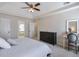 Bright bedroom includes a ceiling fan and a serene space to unwind at 4679 Newell Dr, Marietta, GA 30062