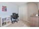 Neutral-toned bedroom with a desk, storage, and closet; perfect for study and relaxation at 4679 Newell Dr, Marietta, GA 30062