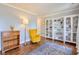 Cozy living room with stylish bookshelves, hardwood floors, and a comfortable seating area at 4679 Newell Dr, Marietta, GA 30062