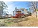 Expansive backyard featuring a deck, lush lawn, and privacy fencing, ideal for outdoor living at 569 Alexander Farms Sw Vw, Marietta, GA 30064