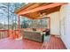 Enjoy the outdoors on this spacious, covered deck with backyard views at 569 Alexander Farms Sw Vw, Marietta, GA 30064