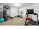 Basement gym with full set of weights and workout equipment at 569 Alexander Farms Sw Vw, Marietta, GA 30064