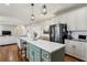 Kitchen featuring an island with bar seating, open to the living area at 569 Alexander Farms Sw Vw, Marietta, GA 30064