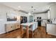 Bright kitchen with island seating, stainless steel appliances, and ample cabinetry at 569 Alexander Farms Sw Vw, Marietta, GA 30064