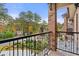 Outdoor balcony view overlooking manicured landscaping and street at 2146 Greensward Ne Dr, Atlanta, GA 30345