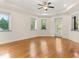Spacious bedroom with natural light, hardwood floors and windows at 2146 Greensward Ne Dr, Atlanta, GA 30345