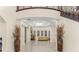 Bright foyer with high ceilings, decorative chandelier, and an open view of the adjacent living spaces at 2146 Greensward Ne Dr, Atlanta, GA 30345