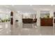 Spacious living room with recessed lighting, large windows and bar area at 2146 Greensward Ne Dr, Atlanta, GA 30345