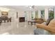 Bright and airy sitting area with large windows, open layout, and views into the dining space at 2146 Greensward Ne Dr, Atlanta, GA 30345