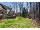 Expansive backyard featuring a well-maintained lawn, bordered by mature trees at 2986 Sedgewick Pl, Marietta, GA 30062