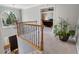 Upstairs foyer featuring a large arch window, staircase, hardwood floors, and natural light at 2986 Sedgewick Pl, Marietta, GA 30062