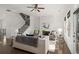 Open living room area with fireplace, lots of light, and a staircase at 4206 Townsend Ln, Atlanta, GA 30346