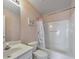 Bathroom featuring a combination tub and shower and a single sink vanity at 907 Redwood Dr, Norcross, GA 30093