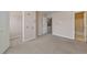 Bedroom showing doorways to bathroom and walk-in closet at 907 Redwood Dr, Norcross, GA 30093