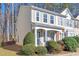 Charming townhome with manicured shrubs at 907 Redwood Dr, Norcross, GA 30093