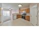 Well-equipped kitchen with modern appliances, ample cabinet space, and an open layout, with easy access to the living area at 907 Redwood Dr, Norcross, GA 30093