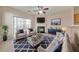 Comfortable living room with fireplace, plush seating, and stylish decor with sliding glass doors at 907 Redwood Dr, Norcross, GA 30093