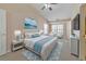 Serene main bedroom featuring a comfortable bed, ample natural light, and a calming color palette at 907 Redwood Dr, Norcross, GA 30093