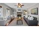 Bright living room with hardwood floors, fireplace, built-in shelves, and neutral color palette at 217 Woodglen Dr, Woodstock, GA 30188