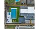 Aerial view showcasing a modern pool, fire pit, and outdoor kitchen; a perfect backyard oasis at 634 Delmar Se Ave, Atlanta, GA 30312