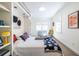 Cozy bedroom with built-in shelving, natural light, and comfortable decor at 1101 United Se Ave, Atlanta, GA 30316