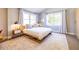 A well-lit bedroom with two large windows, a platform bed, and light neutral tones throughout at 1101 United Se Ave, Atlanta, GA 30316