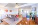 Bright dining room with hardwood floors, leading to an island kitchen area at 1101 United Se Ave, Atlanta, GA 30316