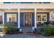 Inviting front porch with seating, plants, and stylish details on a blue house at 1101 United Se Ave, Atlanta, GA 30316