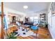 Spacious living room with hardwood floors, opening to the dining room and kitchen at 1101 United Se Ave, Atlanta, GA 30316
