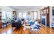 Bright living room featuring hardwood floors, fireplace, and modern furniture at 1101 United Se Ave, Atlanta, GA 30316