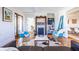 Cozy living room featuring hardwood floors, a fireplace, and stylish furniture at 1101 United Se Ave, Atlanta, GA 30316