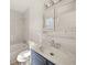 This bathroom features an updated vanity with a white countertop and a shower-tub combo at 130 Valley Rd, Stockbridge, GA 30281