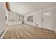 Spacious living area with built-in shelving and cabinetry, and light-colored floors at 130 Valley Rd, Stockbridge, GA 30281