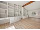 Bright living area with built-in shelves and cabinets, and light-colored floors at 130 Valley Rd, Stockbridge, GA 30281
