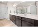 Stylish bathroom with double vanity, modern fixtures, and tiled floors at 169 Aspen Hall Dr, Canton, GA 30115