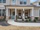 Inviting front porch with seating and charming details, perfect for relaxing outdoors at 169 Aspen Hall Dr, Canton, GA 30115